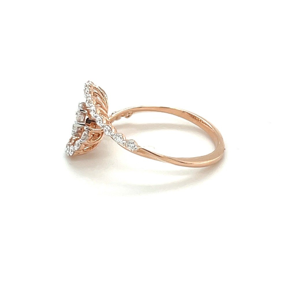 Spiral rose gold ring with round diamond pressure set centerpiece