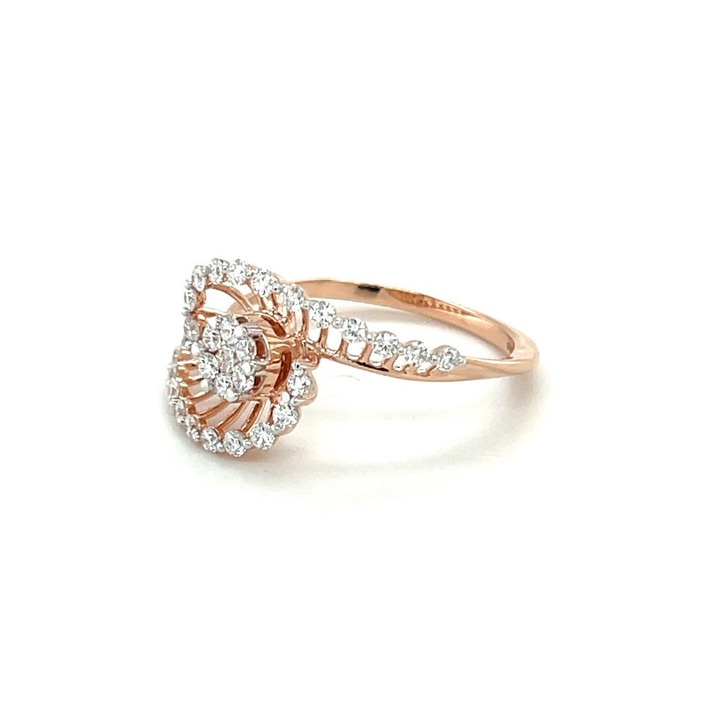 Spiral rose gold ring with round diamond pressure set centerpiece